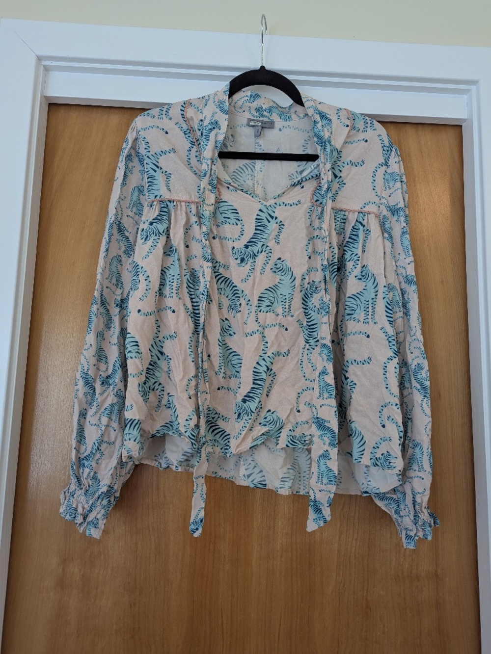 Anthropologie tiger print shirt with pretty crochet trim detail